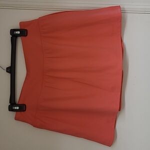 Beautiful peachy salmon colored Skorts w/open side